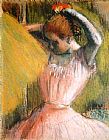 Edgar Degas Famous Paintings - Dancer arranging her hair